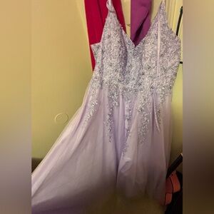 Custom made prom dress. The size is 26.